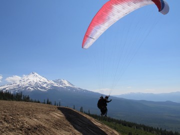 Pilot Rick Ray launching on the first flight taken from the newly completed Whaleback launch, July 27, 2011.