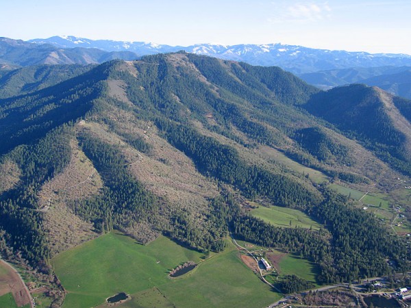 Woodrat Mountain & the Hunter LZ in spring with the snowy peaks of the Siskiyou Crest in the background.